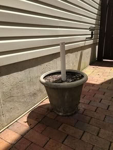 Photo of free Outdoor umbrella stand/planter #2