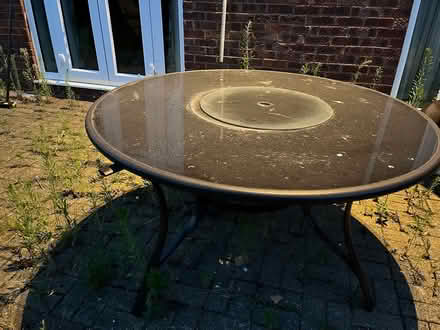 Photo of free Round garden table, glass top (Newport Pagnell, MK16) #1