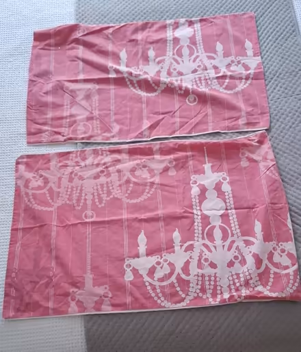 Photo of free 2 x matching pillow cases (pink chandelier print) (Boughton Monchelsea ME17) #1