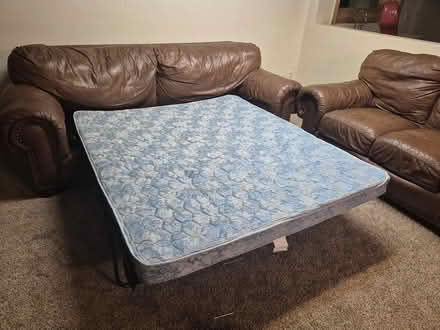 Photo of free leather hide-a-bed, loveseat (Castle Rock) #1