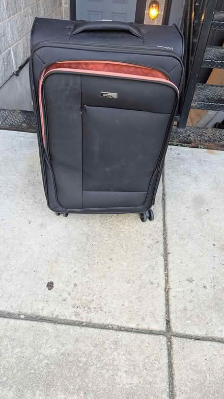Photo of free Large Suitcase on Wheels (Albany Park) #1