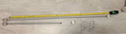Photo of free 2 curtain rods (North Aurora) #1