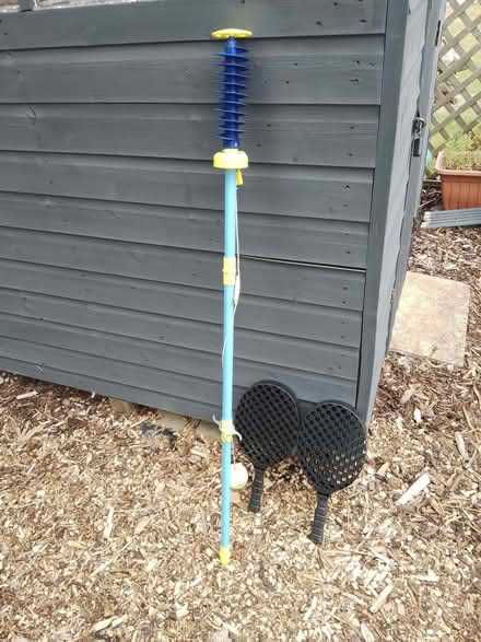 Photo of free Swingball stick (incl cord and ball), and two bats. NO BASE (Furzton MK4) #1