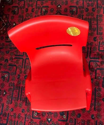 Photo of free Child’s red plastic chair (Cheadle SK8) #1