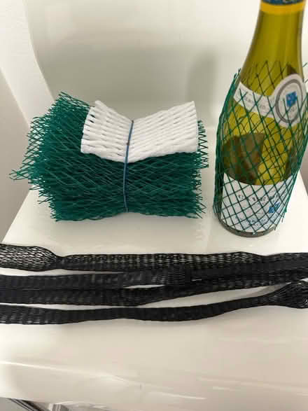 Photo of free Plastic netting for wine bottles (UWS (W. 85th & Riverside Dr.)) #1
