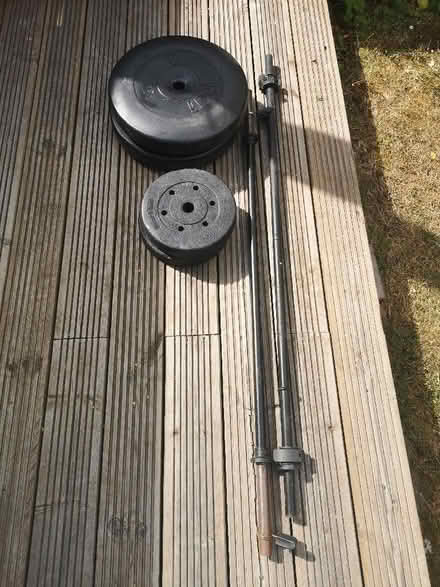 Photo of free Two bar bells plus 2x5kg and 2x15kg weights (Headington OX3) #1
