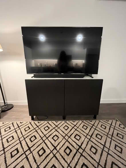 Photo of free TV and TV stand/cabinet (Jamaica Plains) #1