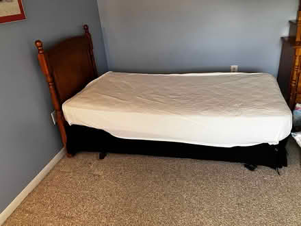 Photo of free 2 single beds linens bedside table (Melbourne Beach Fl) #4