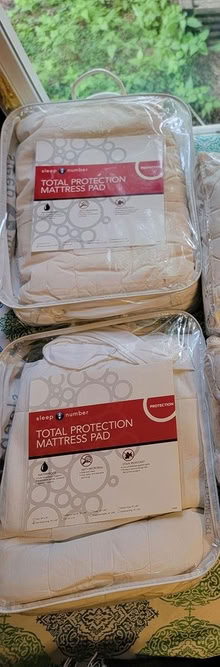 Photo of free 2 Mattress Pads - Split King (West 7th) #1