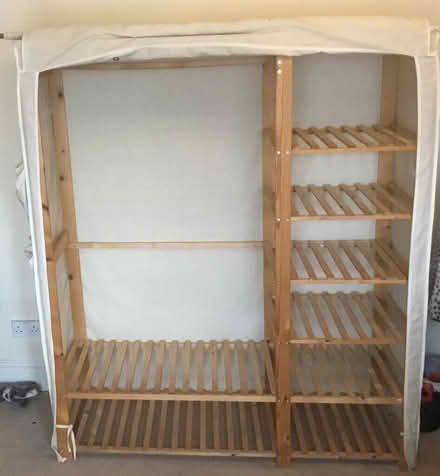 Photo of free wooden wardrobe w linen cover (Potters Bar EN6) #1