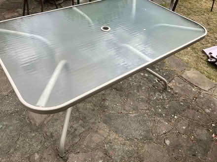 Photo of free Outdoor glass topped patio table (Carshalton) #2