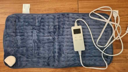 Photo of free Small electric heating pad, new (King Farm) #1
