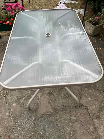 Photo of free Outdoor glass topped patio table (Carshalton) #4