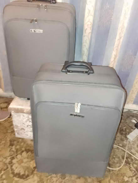 Photo of free Set of 2 Large grey suitcases (Pontefract) #1