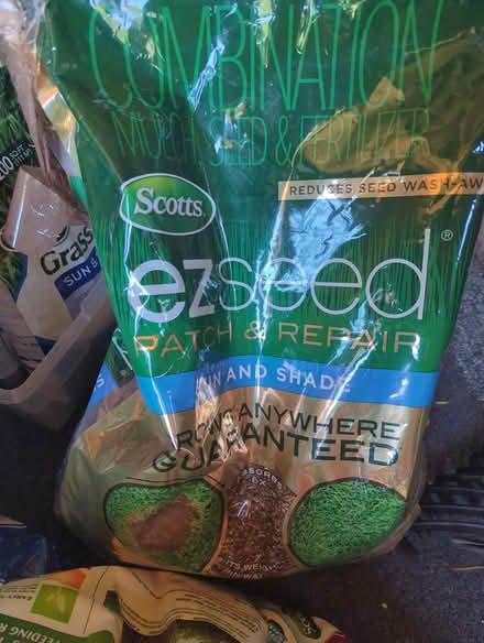 Photo of free Grass Seed & fertilizer (Duren Ave) #1