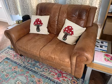 Photo of free Leather 2 seater sofa & footstool (Pipe Aston SY8) #1