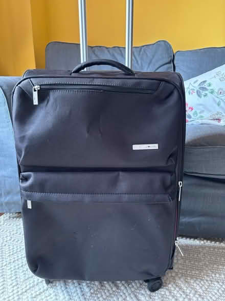 Photo of free Small-medium black suitcase (Rego Park) #1