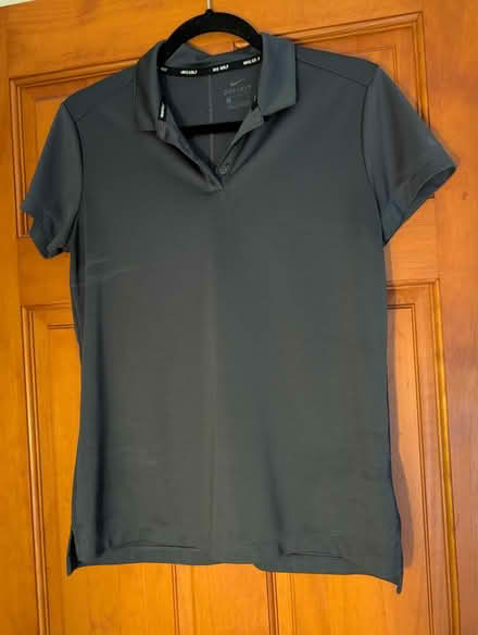 Photo of free Nike Golf shirt women's small (Farmington Hills SE) #1