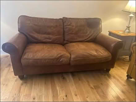 Photo of free Laura Ashley brown leather sofa bed (Spital, wirral) #1