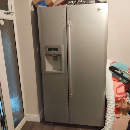 Photo of free Fridge freezer (Ellenbrook M28) #1