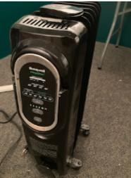 Photo of free space heater with remote (North side of Elmhurst) #1