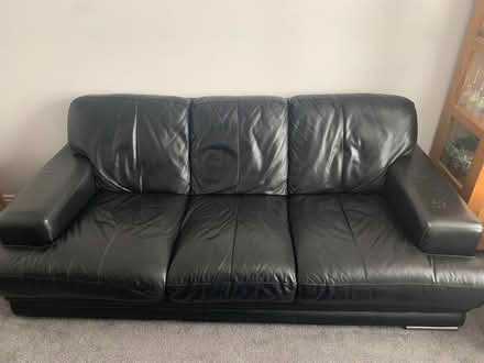 Photo of free DFS 2 x Black Leather Sofa’s and storage box. (Clifton SG17) #1