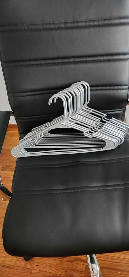 Photo of free 14 sliver plastic hangers (Dracut) #1