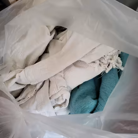 Photo of free 3 Bags old duvets and throws (Warlingham CR6) #1