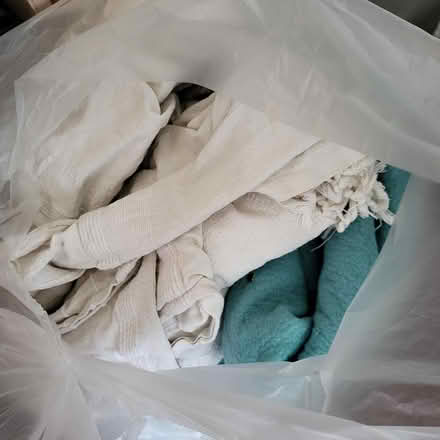 Photo of free 4 Bags old duvets and throws (Warlingham CR6) #1