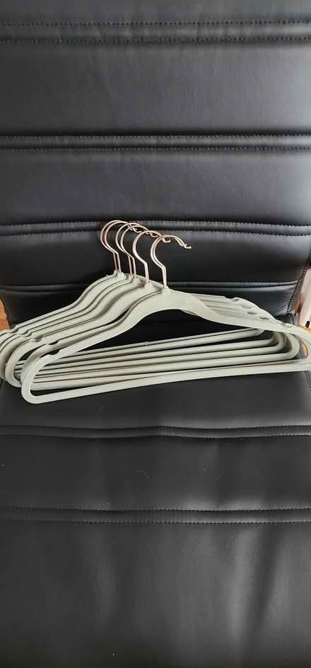 Photo of free 8 gray velvet hangers (Dracut) #1