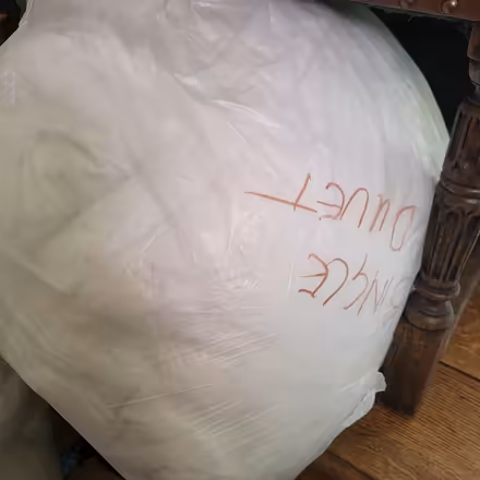 Photo of free 3 Bags old duvets and throws (Warlingham CR6) #3