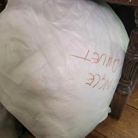 Photo of free 4 Bags old duvets and throws (Warlingham CR6) #3