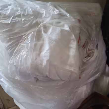 Photo of free 3 Bags old duvets and throws (Warlingham CR6) #2