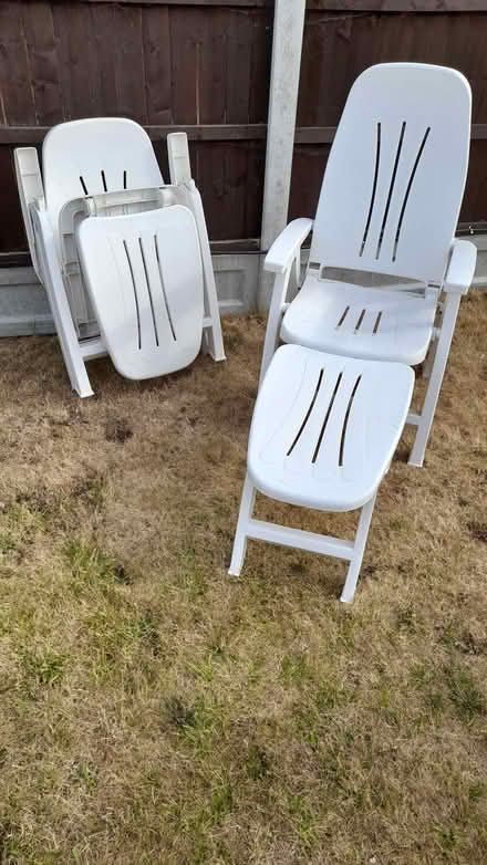 Photo of free 2 White plastic folding garden lounge chairs (Stifford Clays RM16) #1