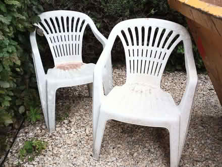 Photo of free 2 white plastic garden chairs (Cam GL11) #1