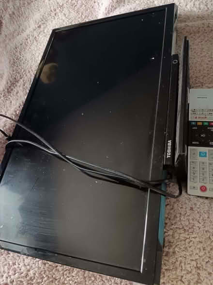 Photo of free 24inch TV & remote (The Rock TF3) #1