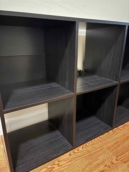 Photo of free Black shelving unit/TV stand (Mission Hill) #1