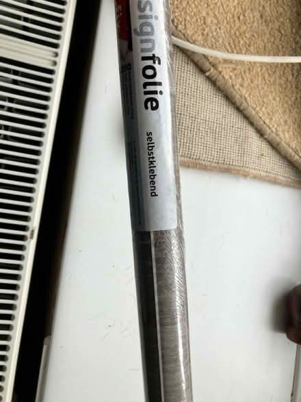 Photo of free 2 rolls of grey wood effect vinyl (TR9 6QL) #1