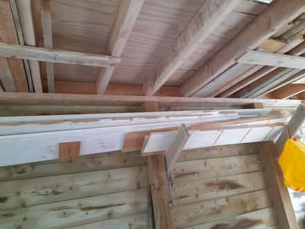 Photo of free wood and dismantled shelving made from planks (Knighton LD7) #3