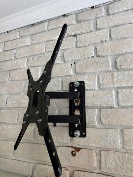 Photo of free Tv mount with two screws (21014) #1