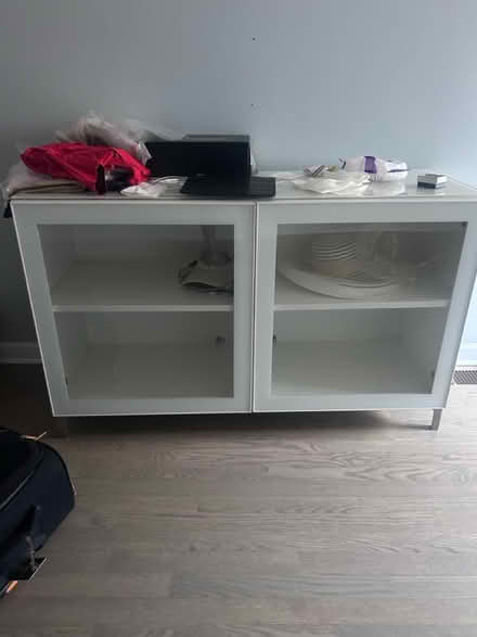 Photo of free White TV Stand with Glass Doors (Jersey City, 07302) #1