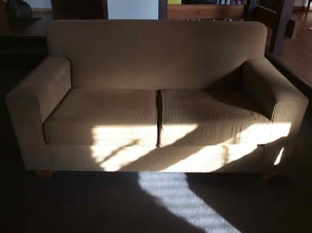 Photo of free Tan two seater couch (Greensborough Vic) #1
