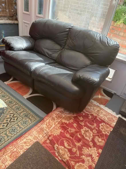 Photo of free 2 black leather settees (Gedling NG4) #2