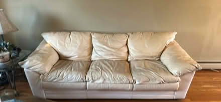 Photo of free Beige leather couch (North Babylon NY) #1