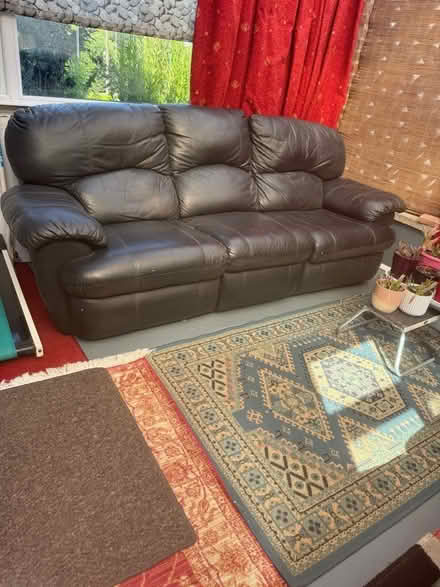 Photo of free 2 black leather settees (Gedling NG4) #1