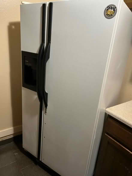 Photo of free side-by-side refrigerator (88th and Garrison) #1