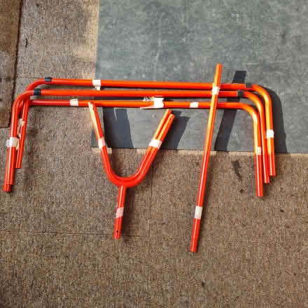 Photo of free Red metal clothes rack- missing piece (The Camp AL4) #1