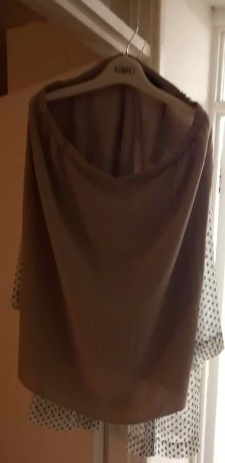 Photo of free 3 women's tops & one skirt. Size 22 (Woking, Surrey.) #1