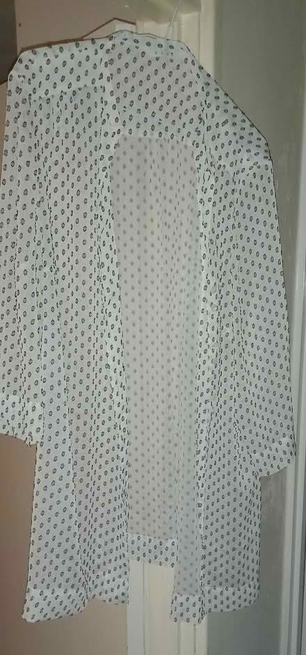 Photo of free 3 women's tops & one skirt. Size 22 (Woking, Surrey.) #3