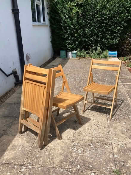Photo of free Folding wooden chairs (4) (Guildford, SW, GU2) #3